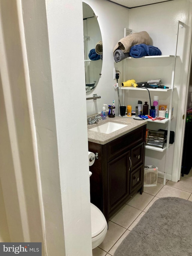 bathroom featuring vanity and tile patterned floors