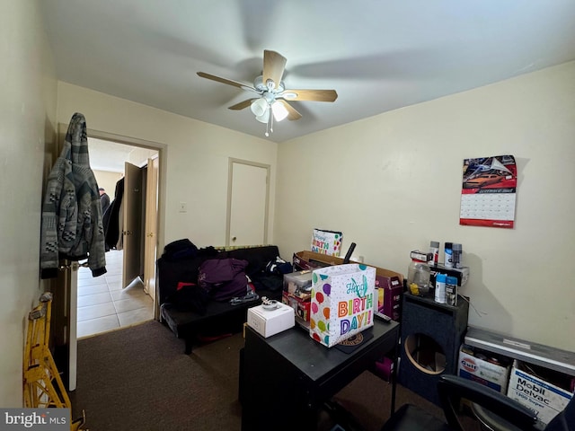 office area with carpet floors and ceiling fan