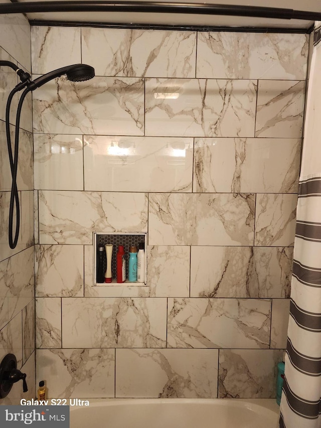 full bathroom with shower / bath combo