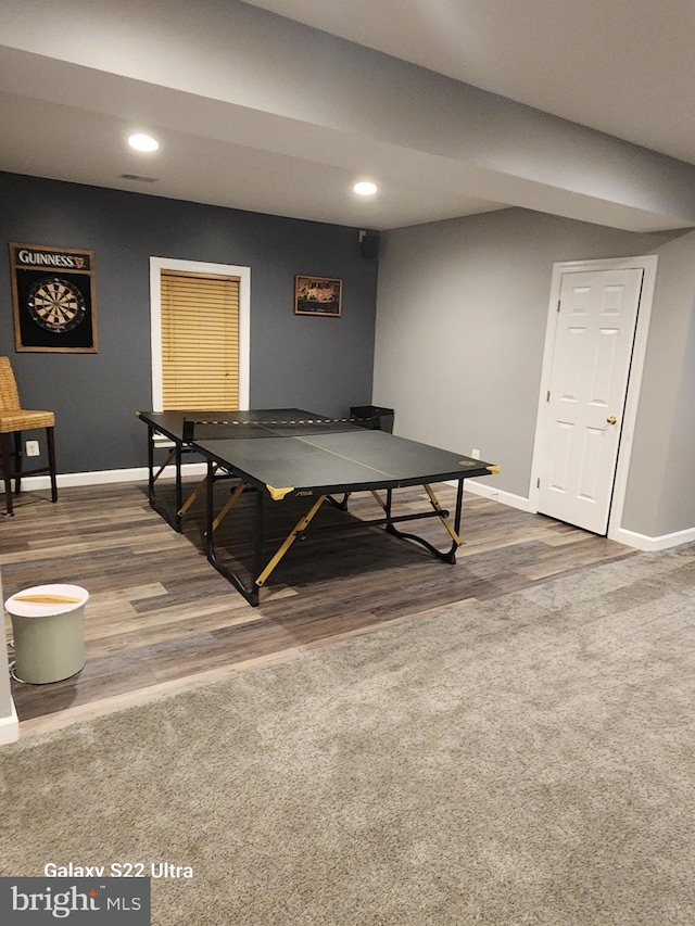 rec room featuring recessed lighting, baseboards, and wood finished floors