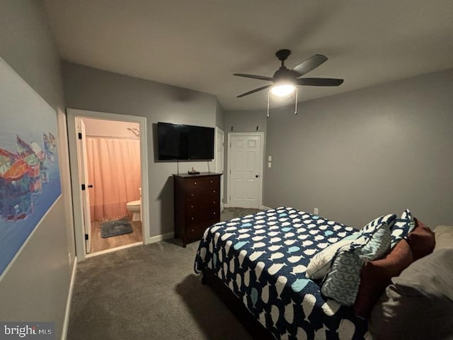 bedroom featuring connected bathroom, a ceiling fan, baseboards, and carpet floors