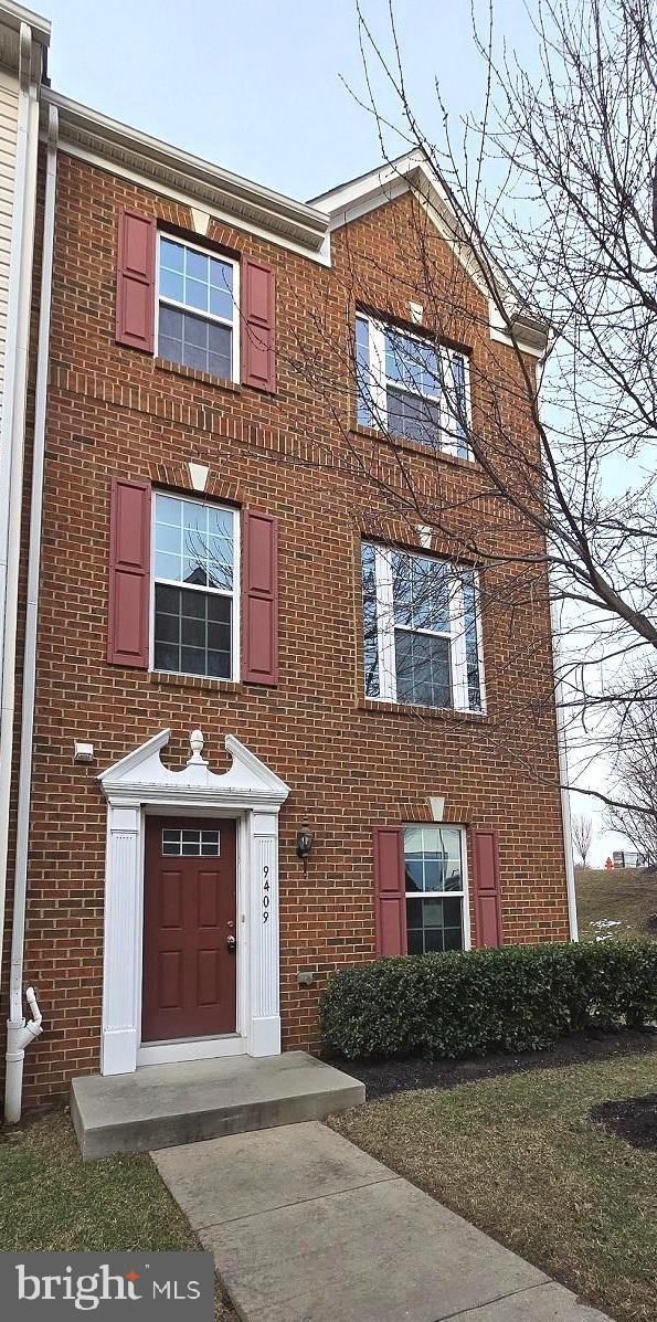 multi unit property featuring brick siding