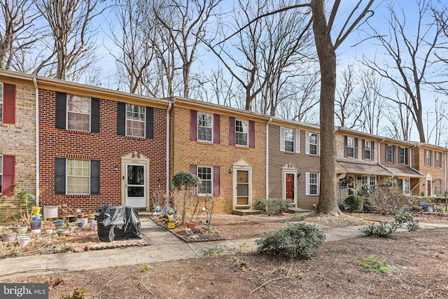 multi unit property with brick siding