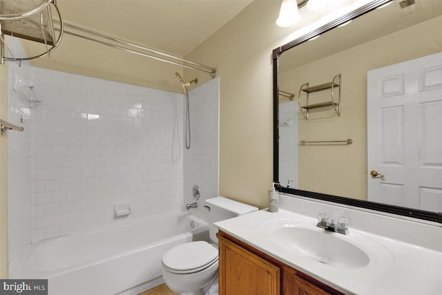 bathroom featuring toilet, washtub / shower combination, visible vents, and vanity