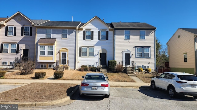 townhome / multi-family property featuring entry steps