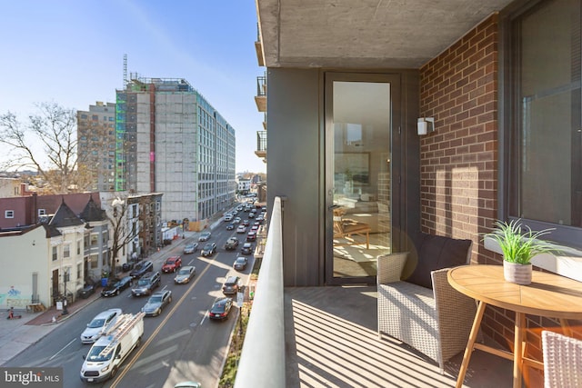 balcony featuring a view of city