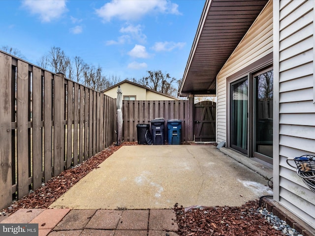 view of patio / terrace featuring fence