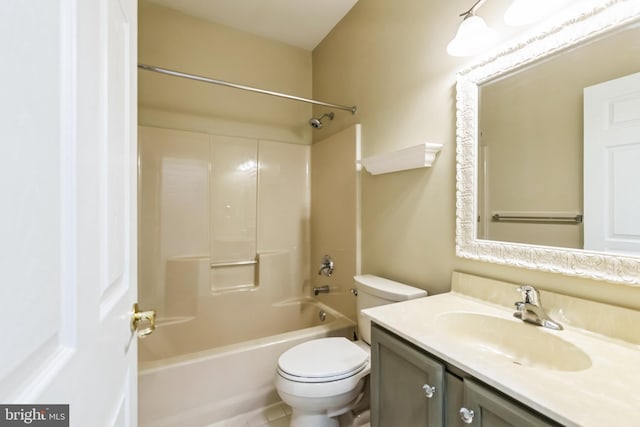 bathroom featuring toilet, shower / tub combination, and vanity