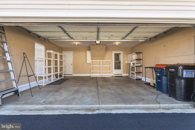 garage with baseboards