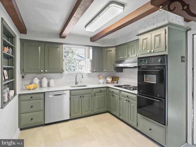 kitchen featuring green cabinets, under cabinet range hood, beam ceiling, black appliances, and a sink