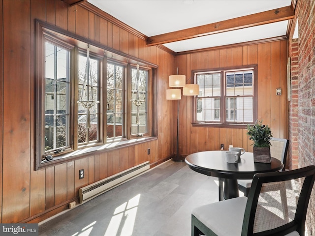 interior space featuring beam ceiling and baseboard heating