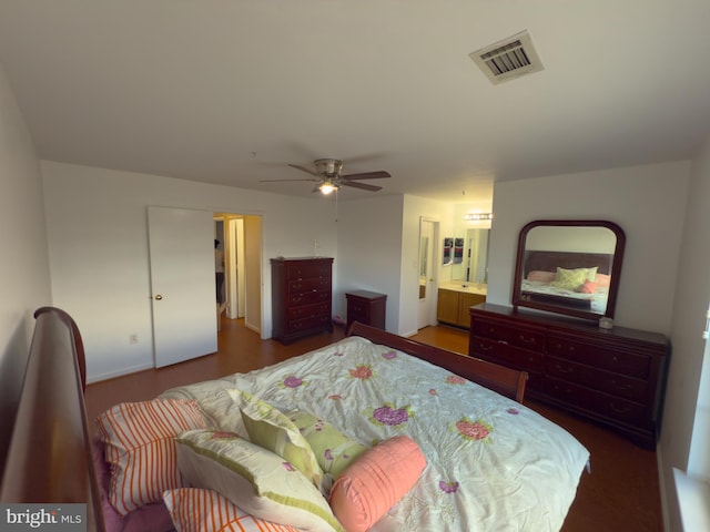 bedroom featuring visible vents and ensuite bathroom