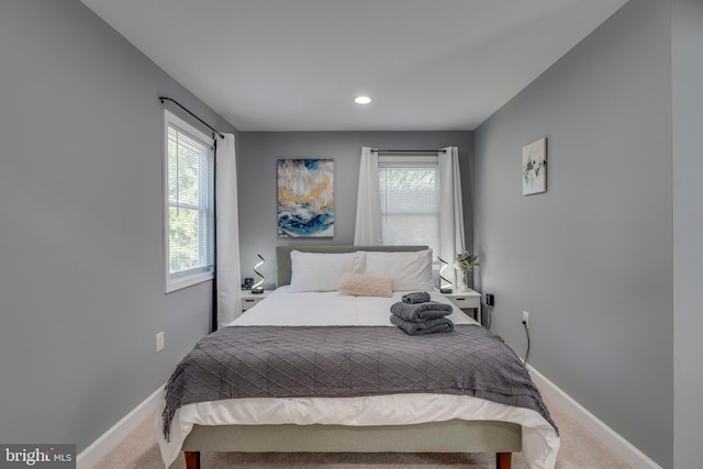 carpeted bedroom with baseboards and recessed lighting