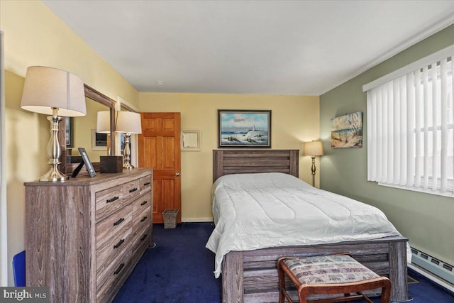 bedroom featuring baseboards, a baseboard heating unit, and dark carpet