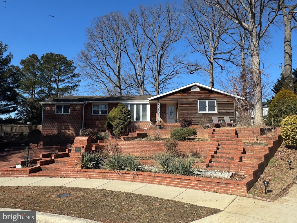 ranch-style home with brick siding