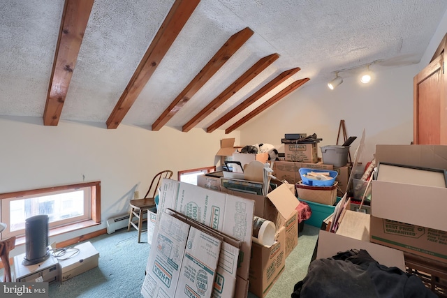 unfinished attic with a baseboard radiator