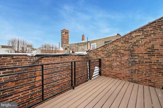 view of snow covered deck