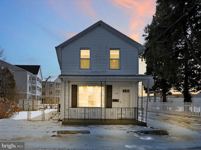 view of front facade with fence