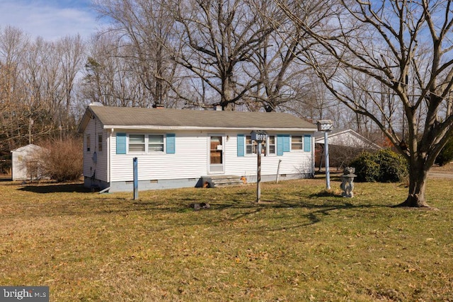 view of front of home with crawl space and a front lawn