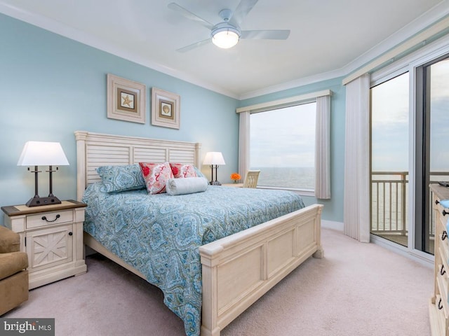 bedroom featuring access to exterior, crown molding, multiple windows, and light colored carpet