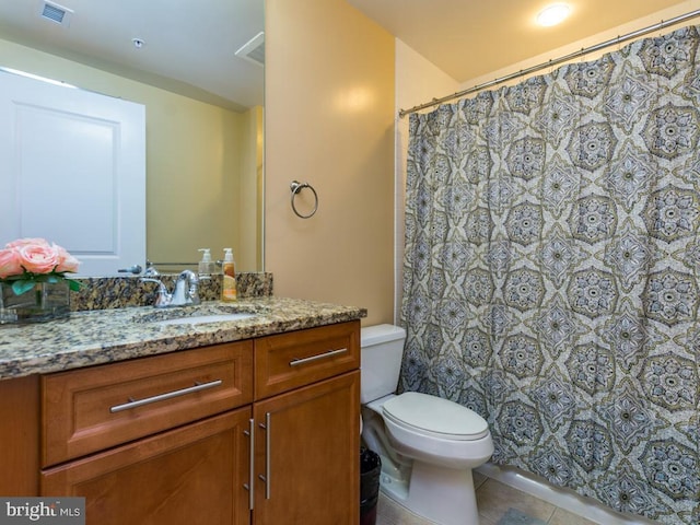 full bath featuring visible vents, vanity, tile patterned flooring, and toilet