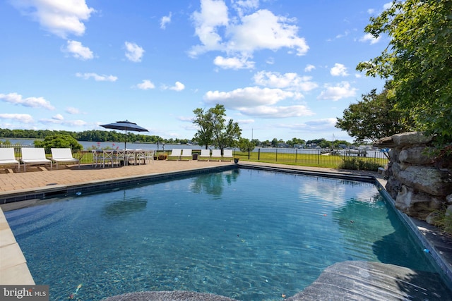 view of pool with a patio, fence, and a fenced in pool