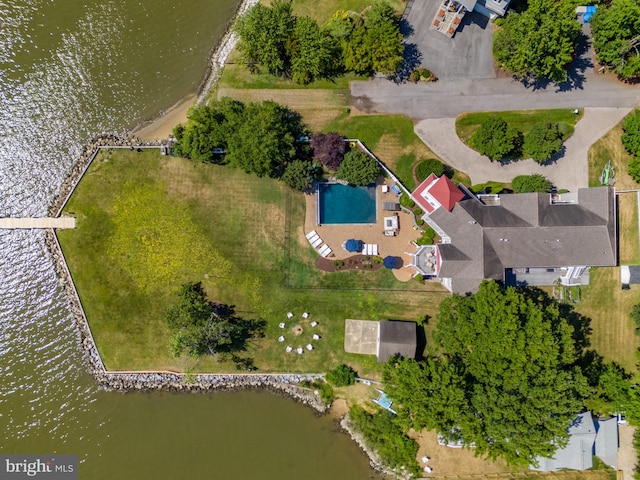 birds eye view of property with a water view