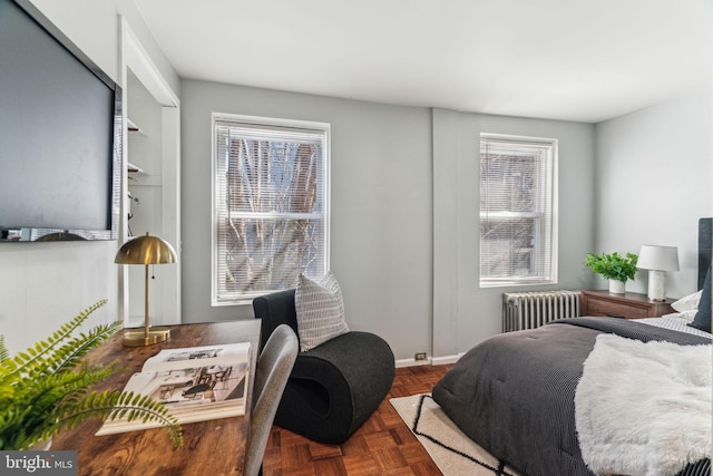 bedroom with radiator heating unit