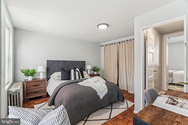 bedroom with radiator heating unit