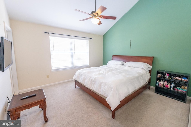 bedroom featuring a ceiling fan, lofted ceiling, light carpet, and baseboards