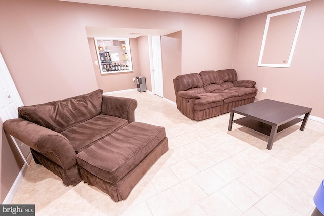 living room featuring baseboards