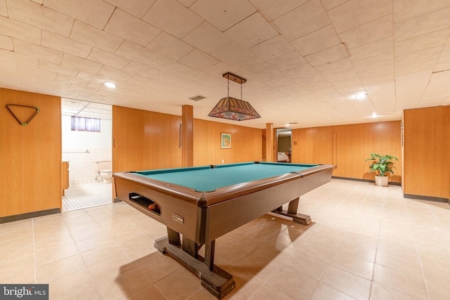 game room featuring pool table, wood walls, and visible vents