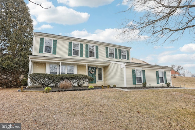 view of front facade with a front yard