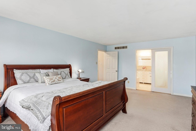 bedroom with baseboards, visible vents, and light colored carpet