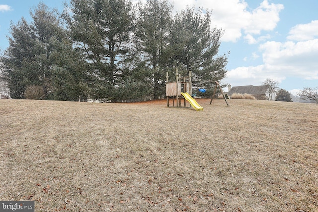 communal playground with a lawn