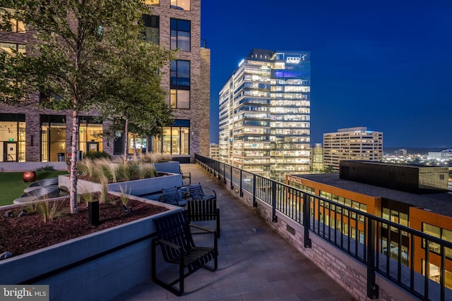 view of property's community with a view of city lights