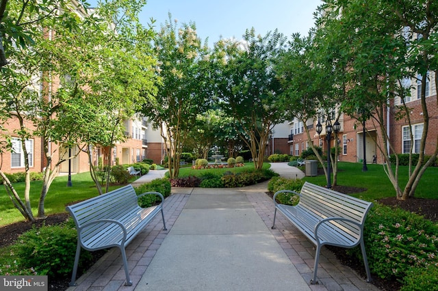 surrounding community featuring a yard