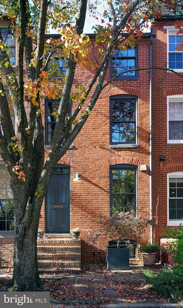 view of front of property with brick siding