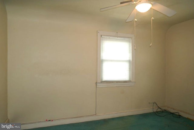 unfurnished room with ceiling fan