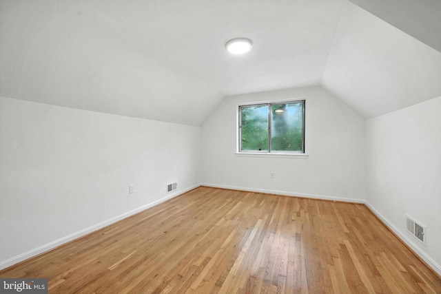 6910 Barnack Dr, Springfield, VA 22152 - bonus room with light wood-style floors and lofted ceiling