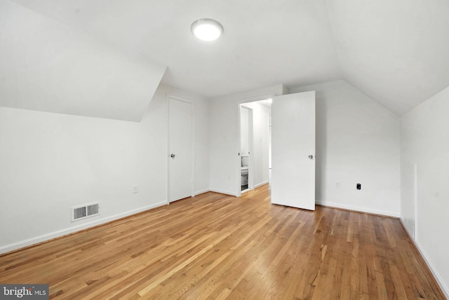 6910 Barnack Dr, Springfield, VA 22152 - additional living space featuring vaulted ceiling and light wood finished floors