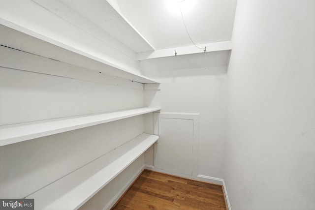 6910 Barnack Dr, Springfield, VA 22152 - walk in closet featuring wood finished floors