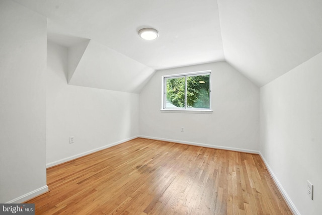 6910 Barnack Dr, Springfield, VA 22152 - bonus room with wood-type flooring and lofted ceiling