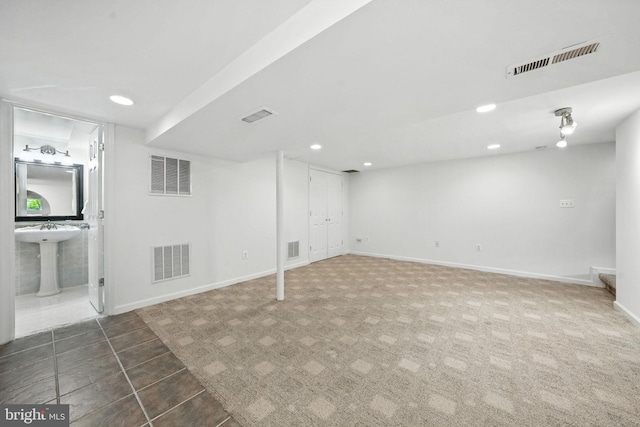 6910 Barnack Dr, Springfield, VA 22152 - finished basement with recessed lighting and carpet flooring
