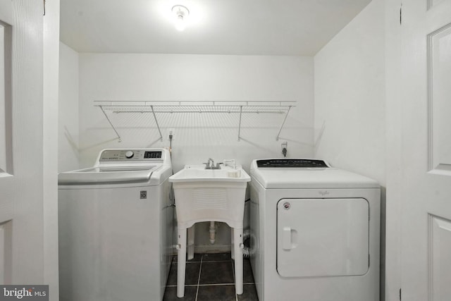 6910 Barnack Dr, Springfield, VA 22152 - laundry room with separate washer and dryer and tile patterned flooring