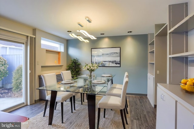 dining room with dark wood-style floors