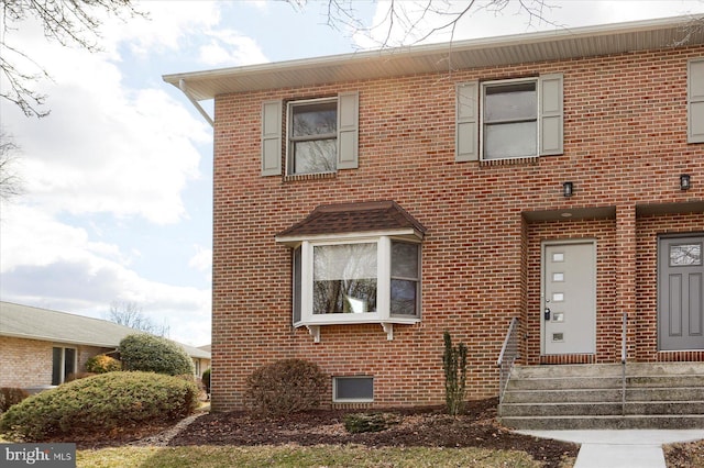 view of front facade with brick siding