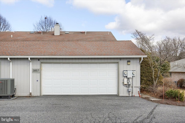 garage featuring central AC unit