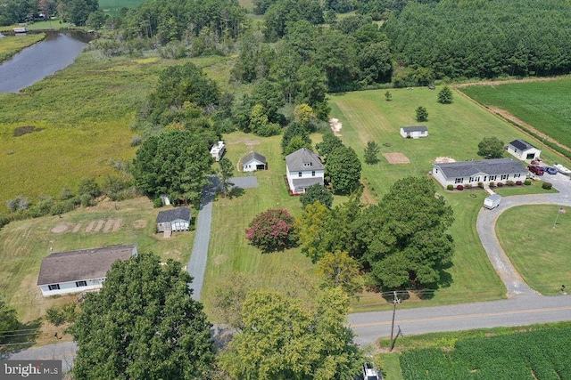 drone / aerial view featuring a water view and a rural view