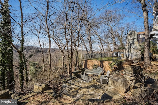 view of yard with outdoor dining area and a patio area